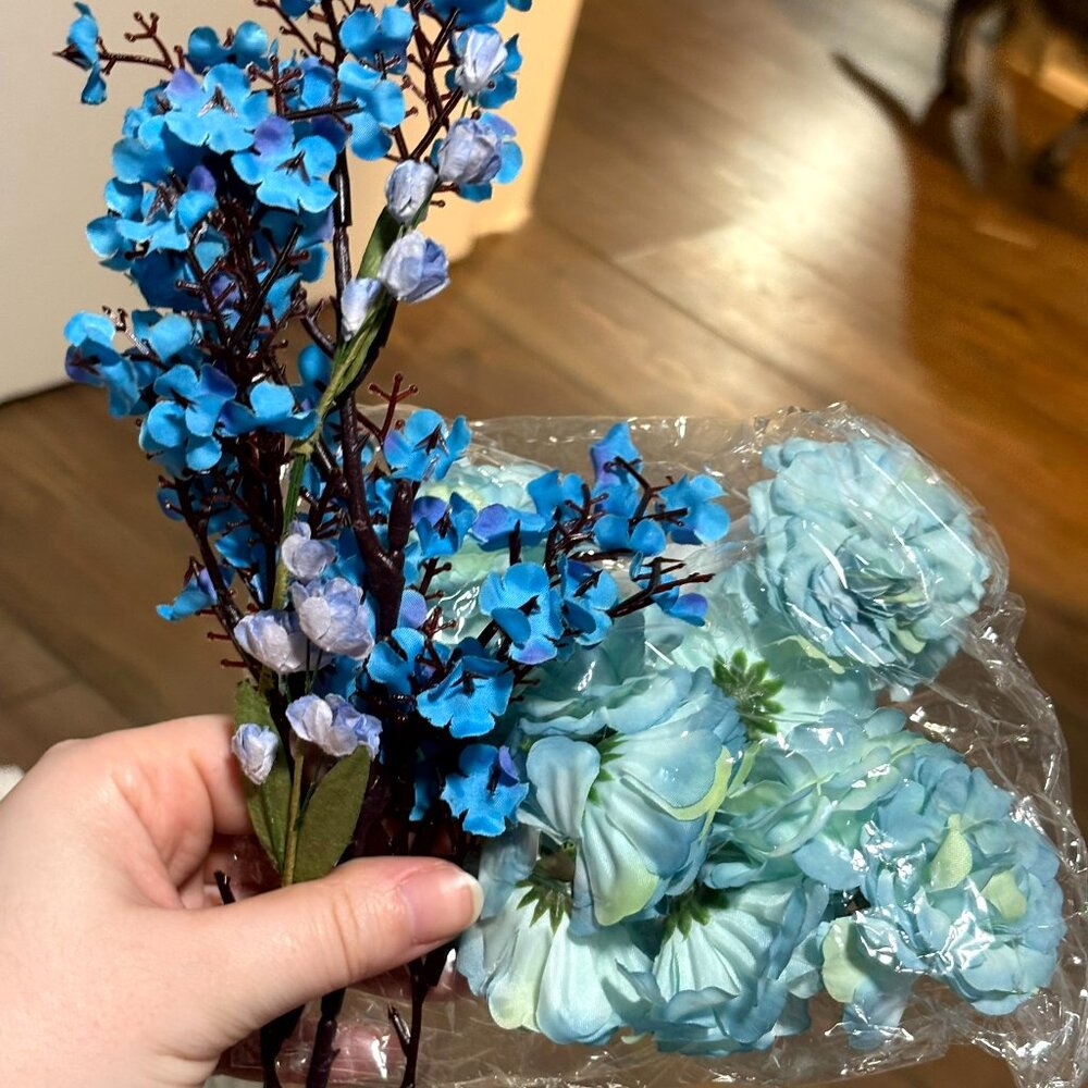 blue fake flowers. never used